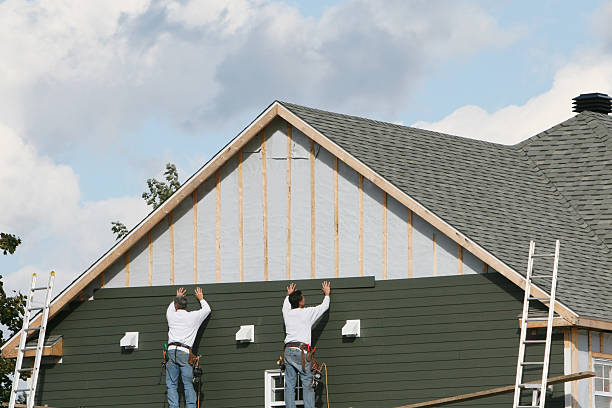 Professional Siding technician working in Dover, KY